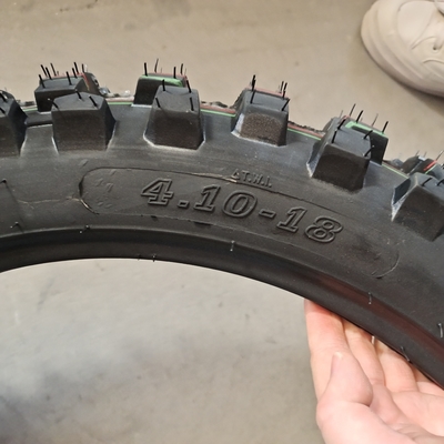 Pneumático de motocicleta sin tubo de nylon de caucho natural directo 4.10-18 para ruedas y neumáticos de motocicleta